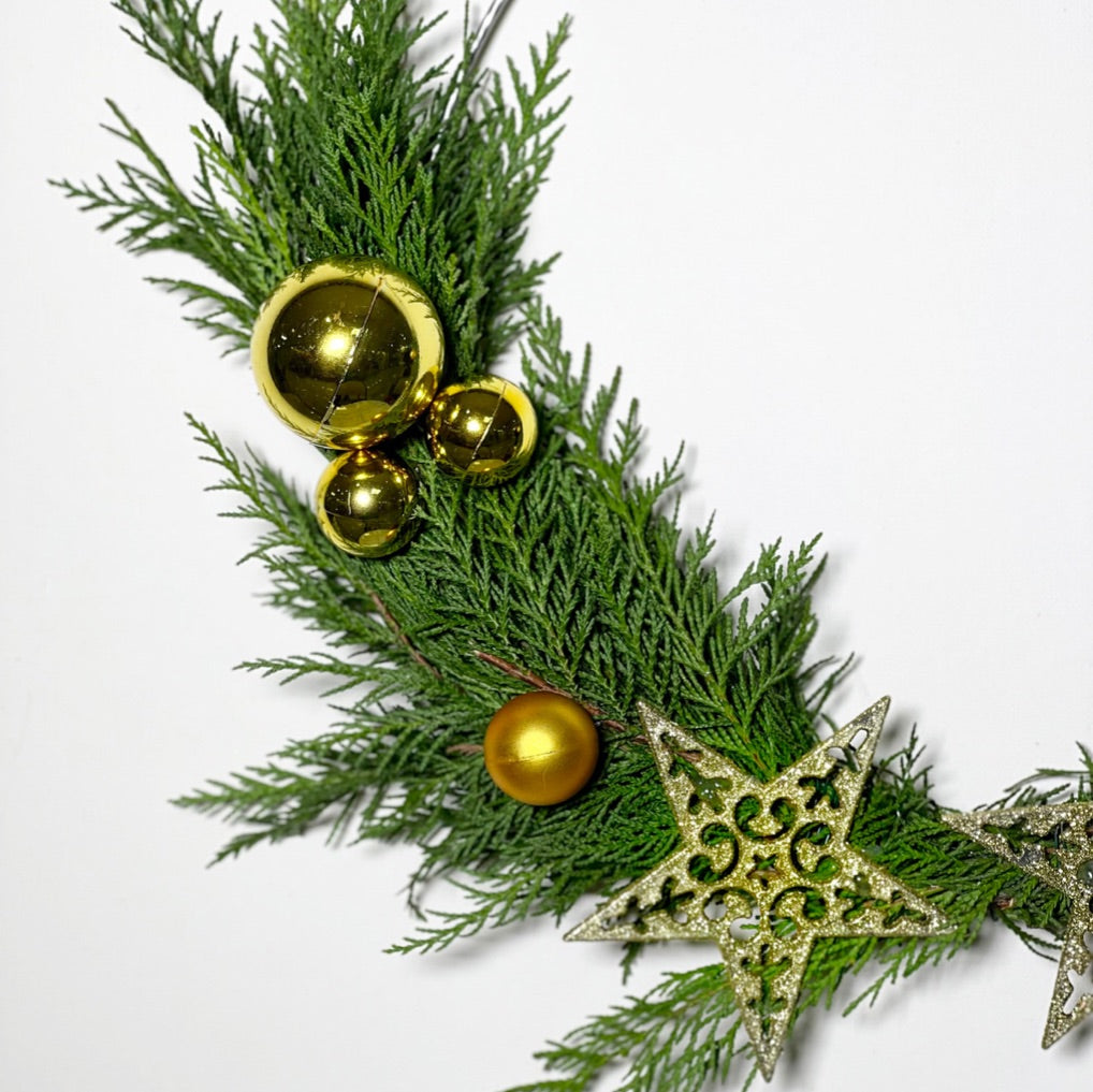 Guirlanda Estrela de Natal Dourada